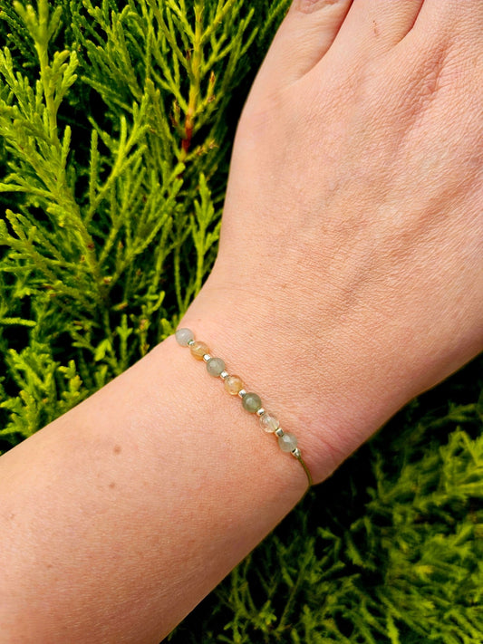 Handmade Adventurine and Citrine bracelet featuring vibrant green and yellow stones with silver accents, perfect for everyday wear and gifting.
