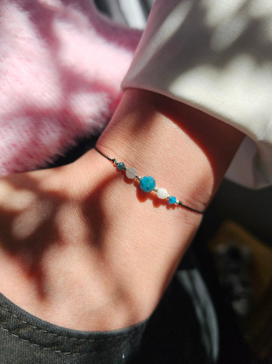 Close-up of Apatite and Moonstone charm bracelet – handmade in Ireland
Gift-wrapped energy bracelet for intuition, peace.