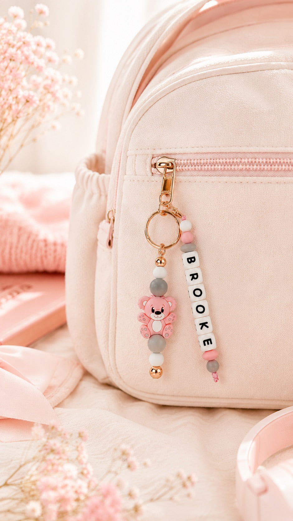 Personalised pastel silicone bag charm with teddy bear and name beads
