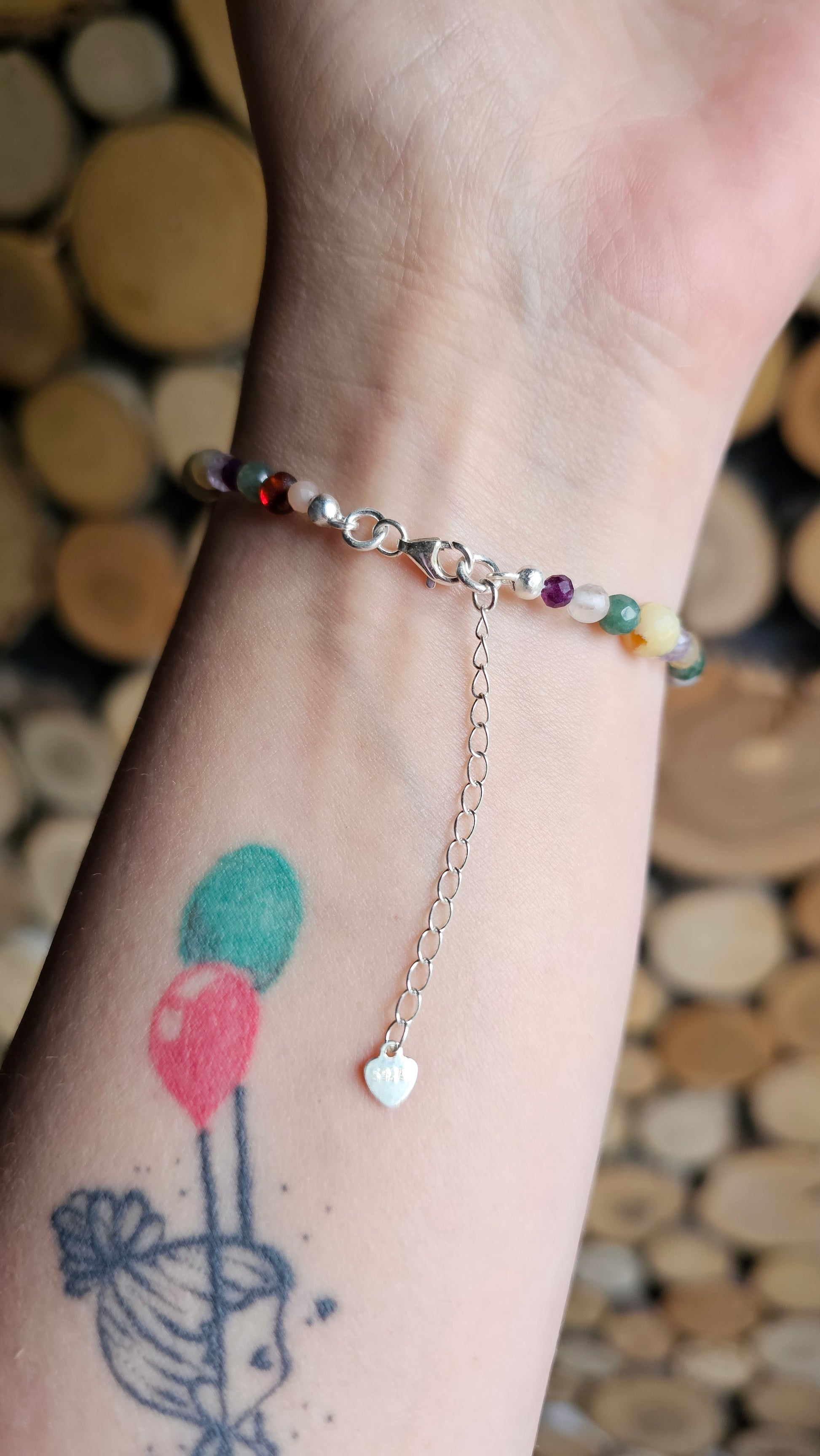 Handmade gemstone bracelet in warm autumn colours with silver clasp.