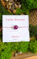 Amethyst lucky thread bracelet with 8mm natural gemstone and two 925 sterling silver diamond-cut beads on violet string.