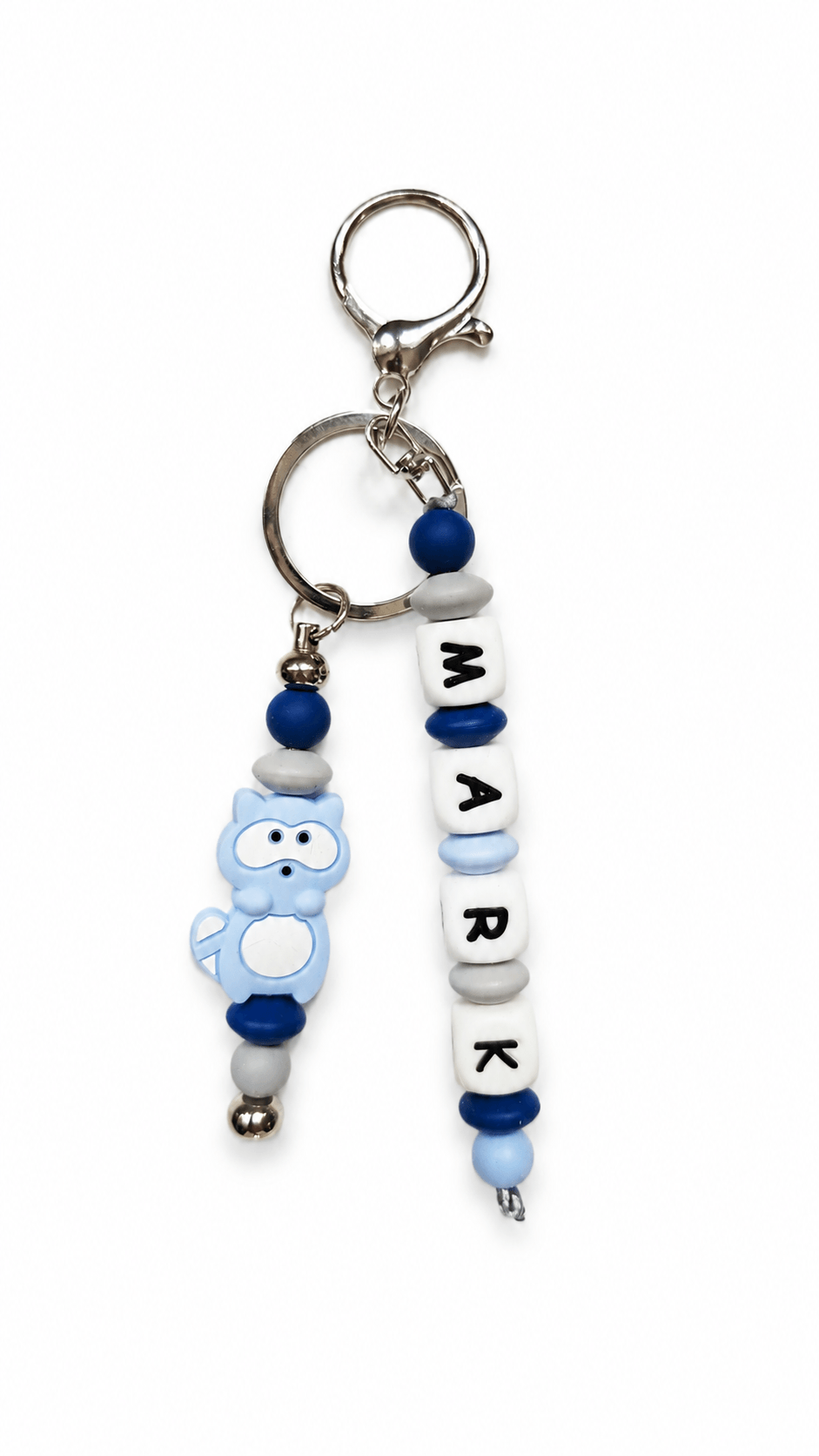 Custom boys name keychain made with colourful silicone beads, personalised backpack charm for school bags, lunchboxes and gym bags.
