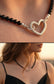 Handmade Black Tourmaline gemstone necklace with a solid 925 sterling silver heart clasp, crafted in Ireland.