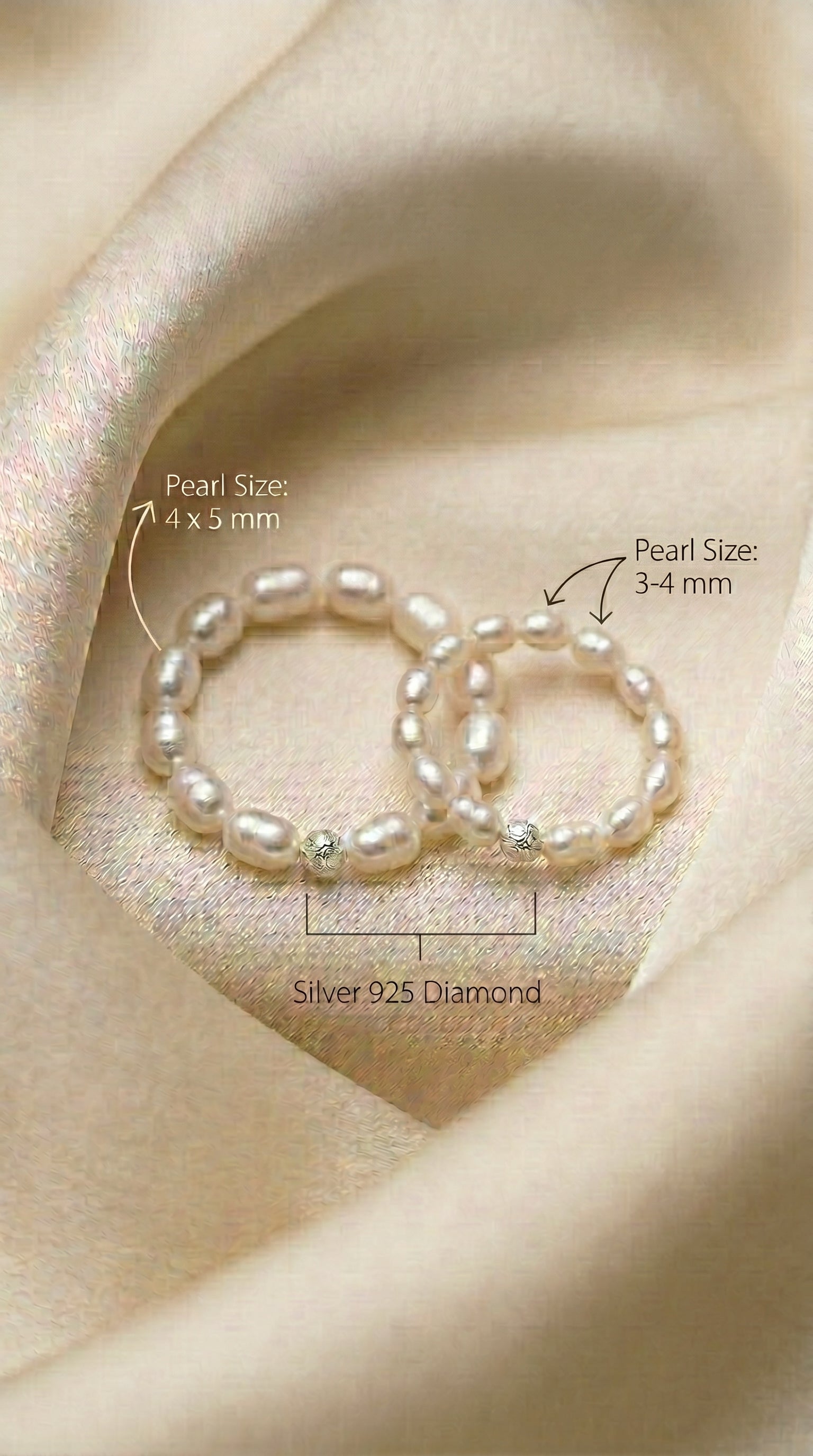 A close-up shot of the Timeless Rice Pearl Elastic Ring, featuring genuine, lustrous white rice-shaped freshwater pearls and a sparkling diamond-cut 925 sterling silver bead.