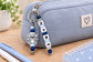 Personalised colourful silicone name charm for nappy bags, backpacks and keys
