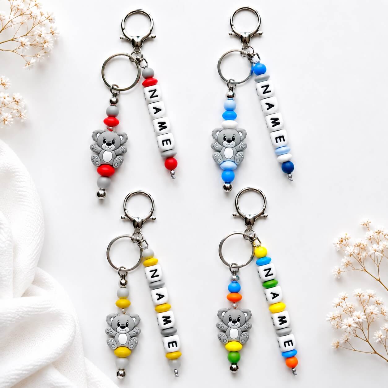 Personalised colourful silicone name charm for nappy bags, backpacks and keys
