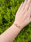 Handcrafted Gemini Zodiac Bracelet featuring natural agate and quartz gemstones on an adjustable silver cord, symbolising clarity, adaptability, and mental sharpness.