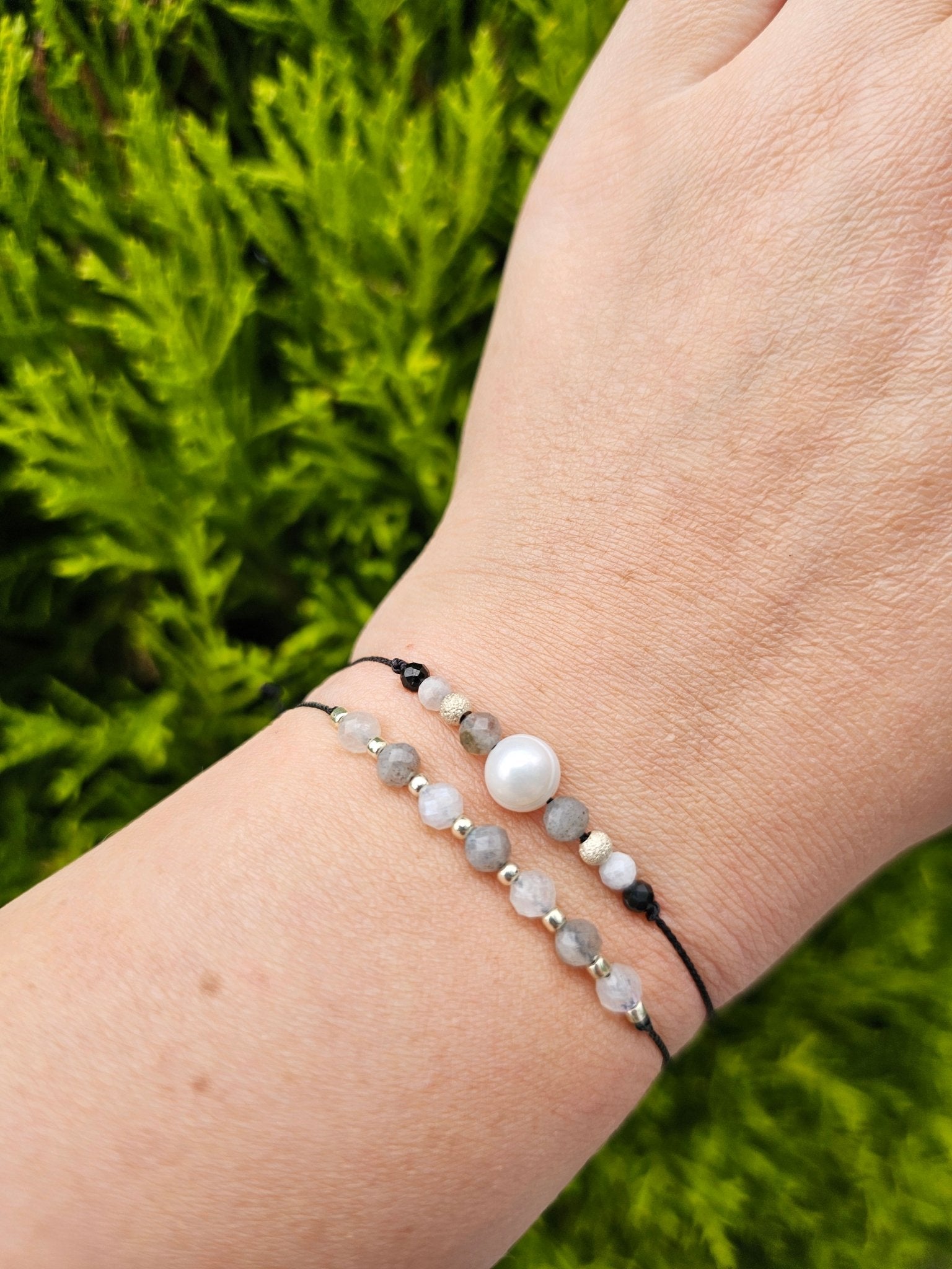 Handmade Labradorite and Moonstone bracelet with sterling silver beads and adjustable cord. Natural stones for protection, intuition, and emotional balance.