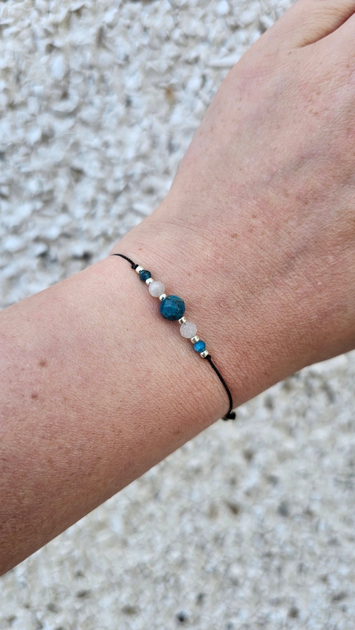Handmade lucky bracelet with Apatite and Moonstone for healing and protection
Emotional healing bracelet with red string and natural gemstones
Adjustable lucky bracelet for balance and spiritual clarity
Close-up of Apatite and Moonstone charm bracelet – handmade in Ireland
Gift-wrapped energy bracelet for intuition, peace and inner growth
