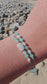 Handmade Friends Forever bracelet with Moonstone and Amazonite – a meaningful crystal gift for best friend. Features sterling silver adjustable clasp, soft durable cord, and elegant gift pouch. Symbol of trust, love, harmony and emotional connection.
