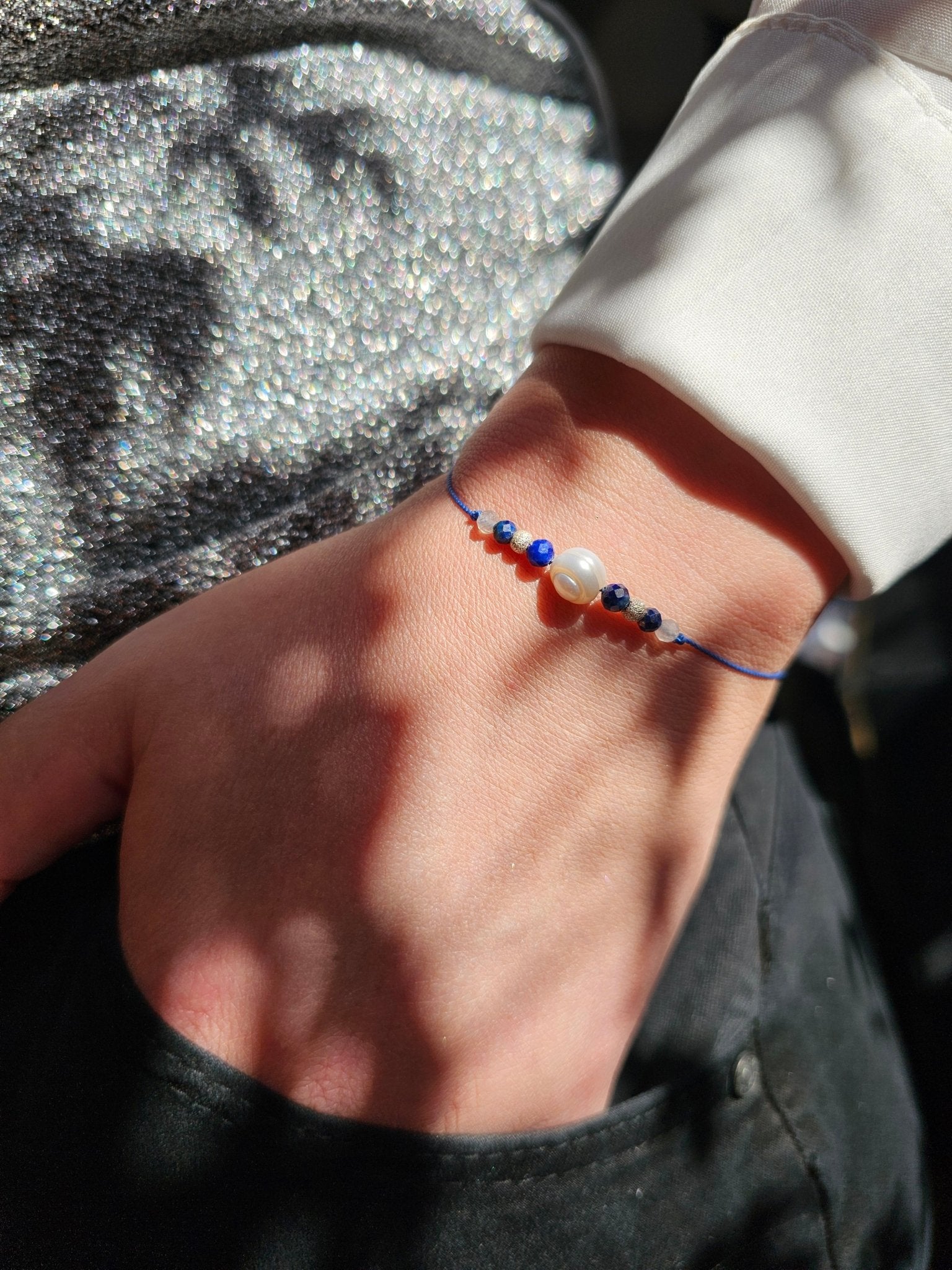 Handmade Sagittarius zodiac bracelet with labradorite and lapis lazuli
Astrology jewellery gift for Sagittarius woman
Adjustable silk cord bracelet with sterling silver and gemstones
Spiritual Sagittarius bracelet with pearl and healing crystals
Elegant handmade zodiac jewellery for November and December birthdays
