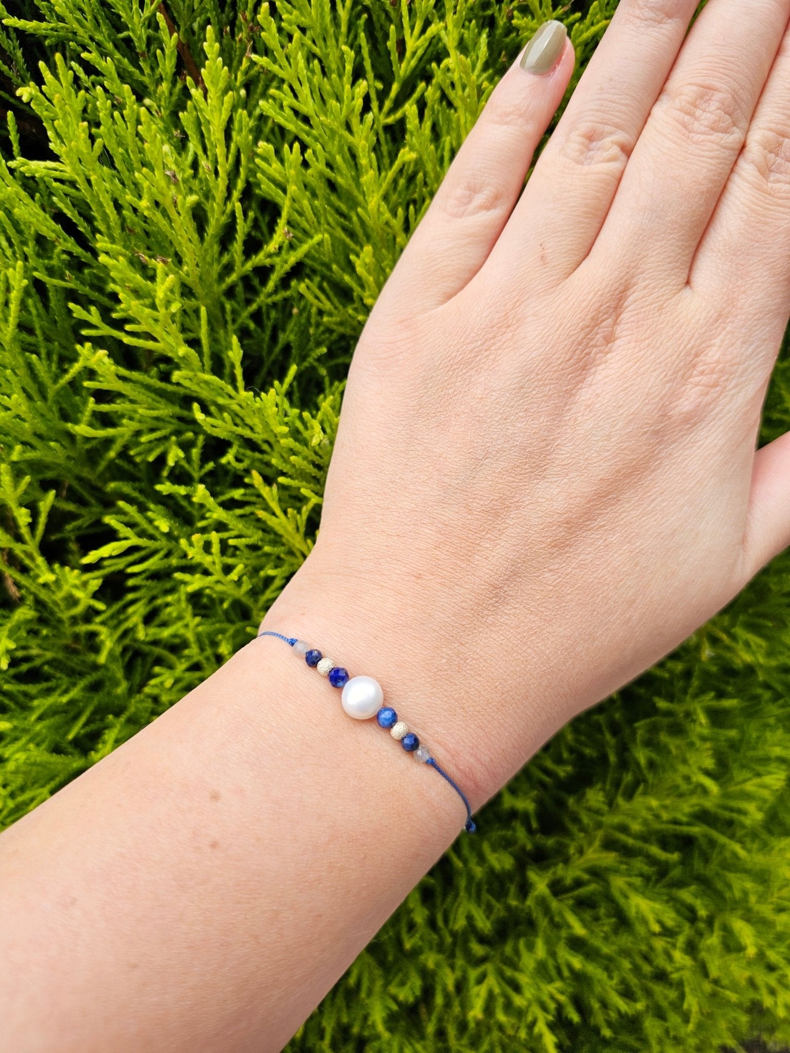 Handmade Sagittarius zodiac bracelet with labradorite and lapis lazuli
Astrology jewellery gift for Sagittarius woman
Adjustable silk cord bracelet with sterling silver and gemstones
Spiritual Sagittarius bracelet with pearl and healing crystals
Elegant handmade zodiac jewellery for November and December birthdays
